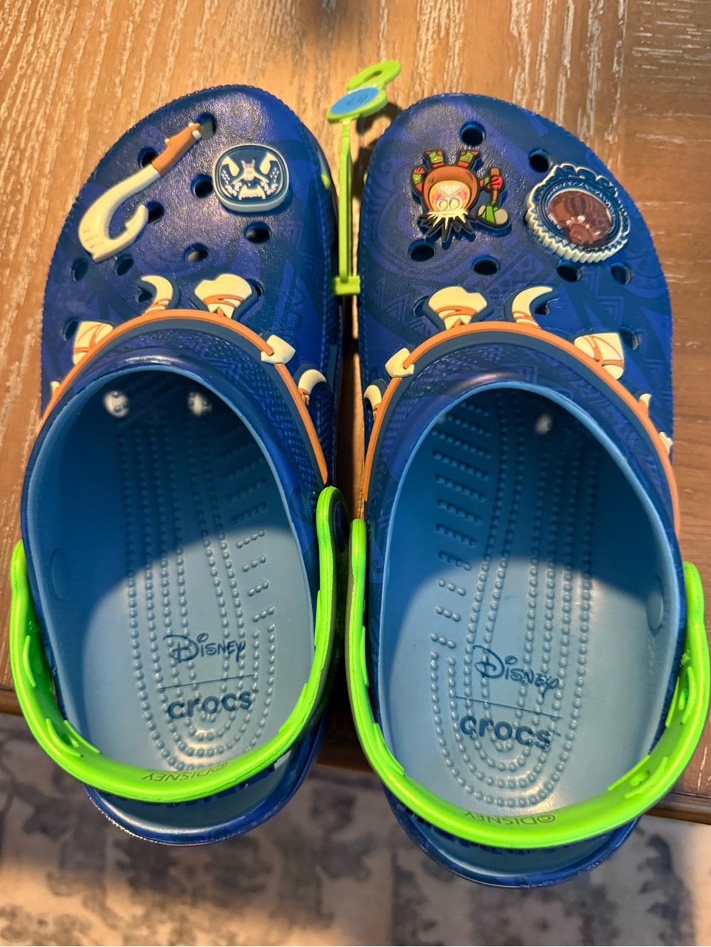 Disney’s Moana Blue Kids Crocs Sandals with Neon Green Heel Strap
